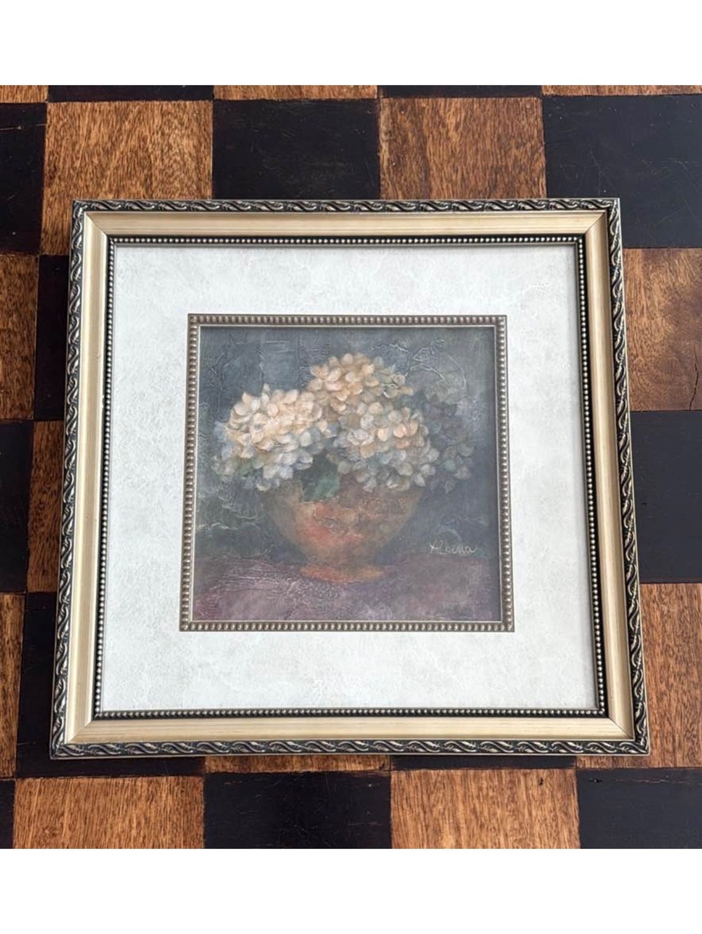 Beautiful gold frame with cute vintage flower vase